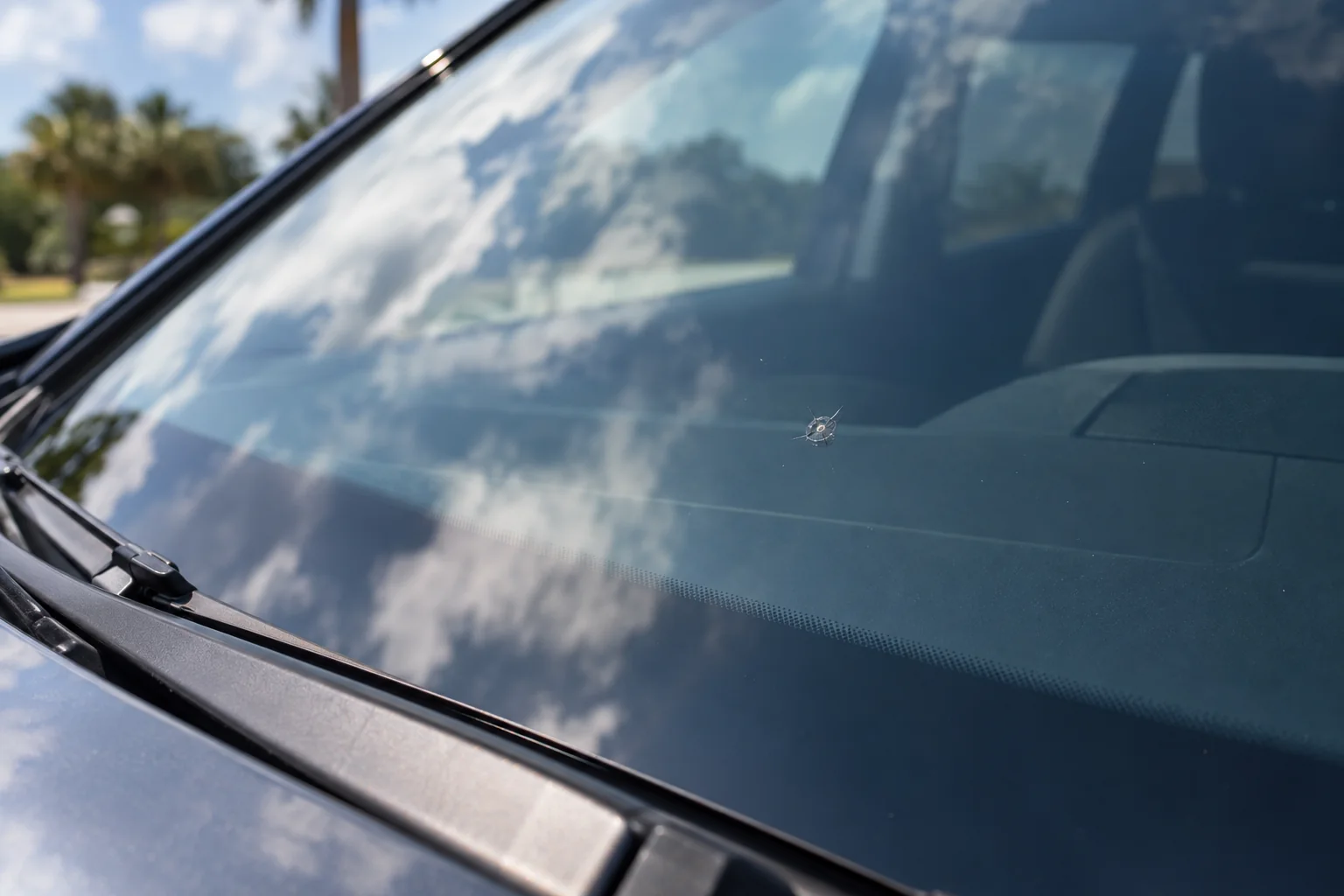 Small stone chip in a car windshield
